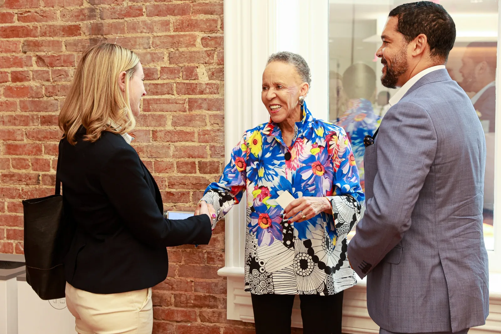 Payne Research Center event — Dr. N. Joyce Payne engaging with guests